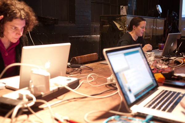 Kathy elbows deep in programing